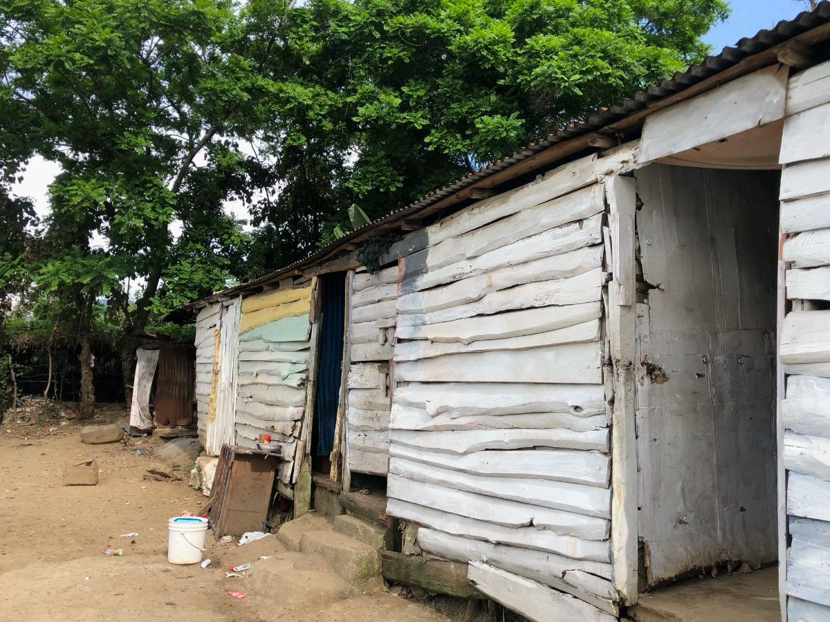 worn down house in community in the Dominican Republic